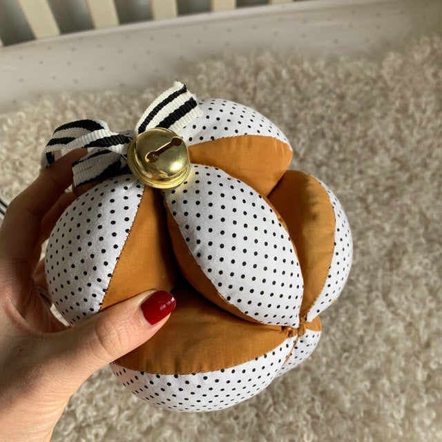 Clutch Ball with Ribbon & Bell